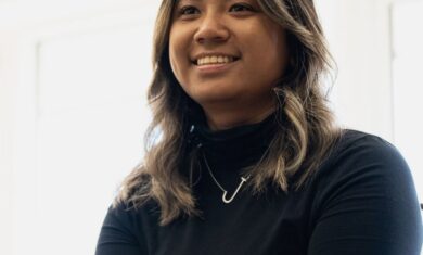 A striking photo of a young, brown-haired woman, as she takes part in a 'Who's Listening' workshop.